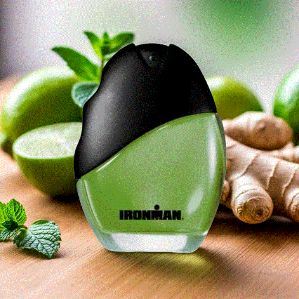 Ironman Eau De Toilette men's cologne spray bottle with fresh citrus and green mint background